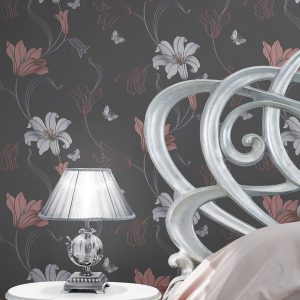 Lamp on a night table next to a bed