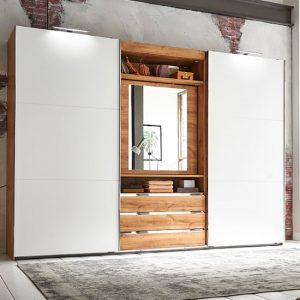 magic-mirrored-sliding-wardrobe-planked-oak-tv-shelf