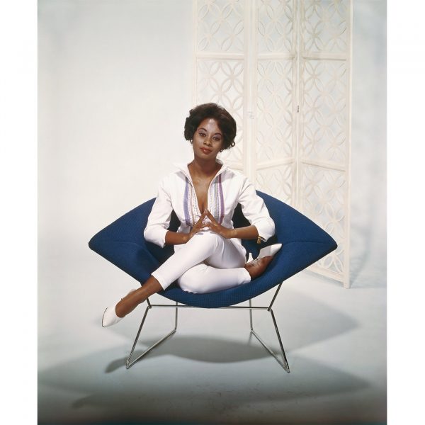 young_woman_sitting_on_chair